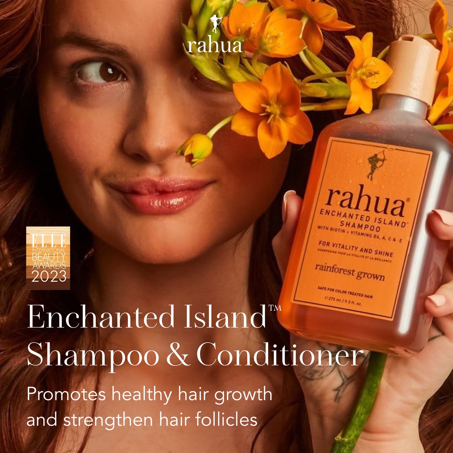 woman holding Rahua enchanted island shampoo and conditioner bottle with flowers