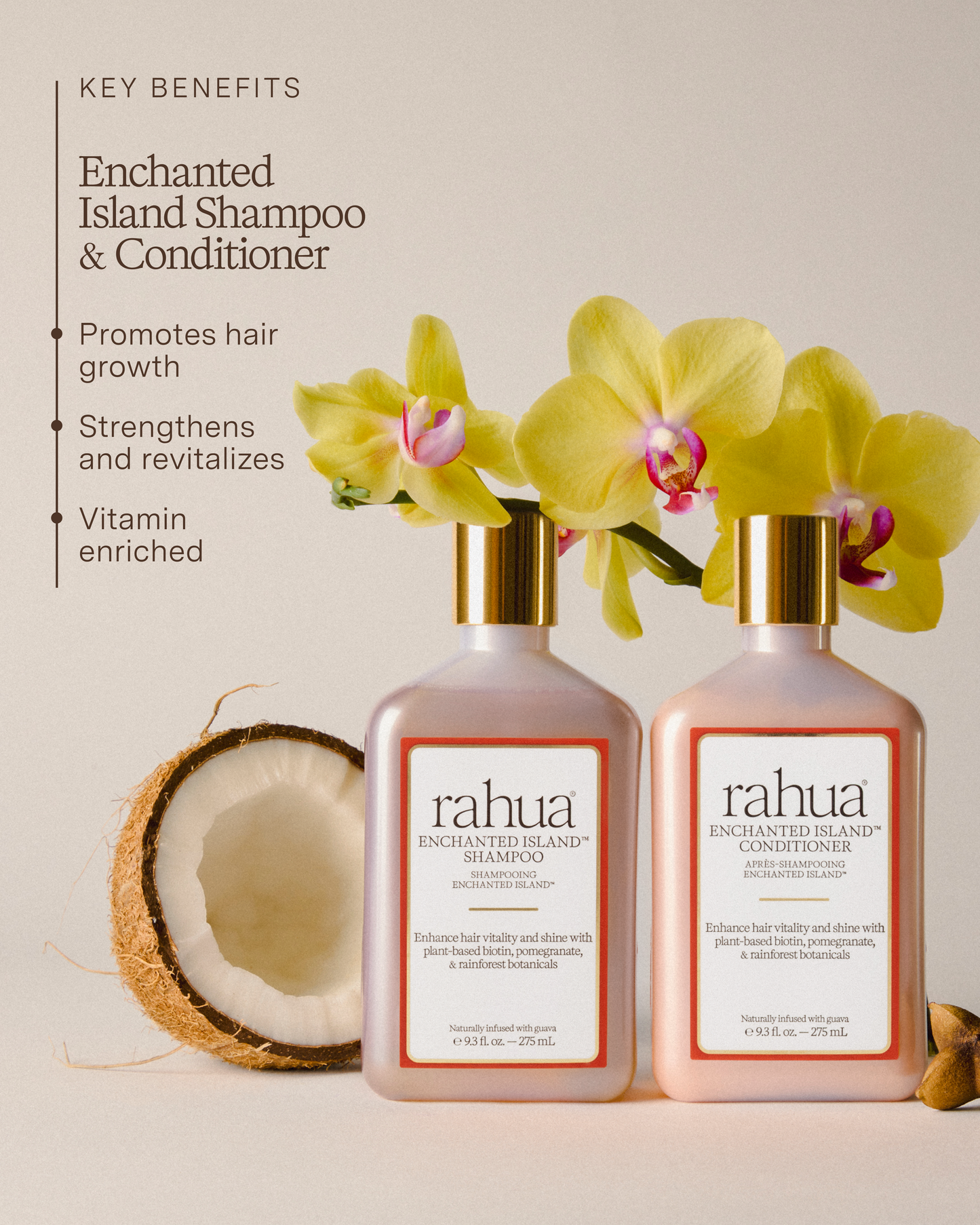 Two bottles of rahua Enchanted Island Shampoo and Conditioner with flowers and a coconut on a light background.|variant:93-oz,16-oz
