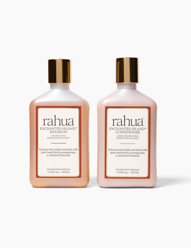 variant:93-oz

two bottles with gold caps and labels of rahua enchanted island and conditioner on a plain white background, new label with an orange and gold outline with brown black text