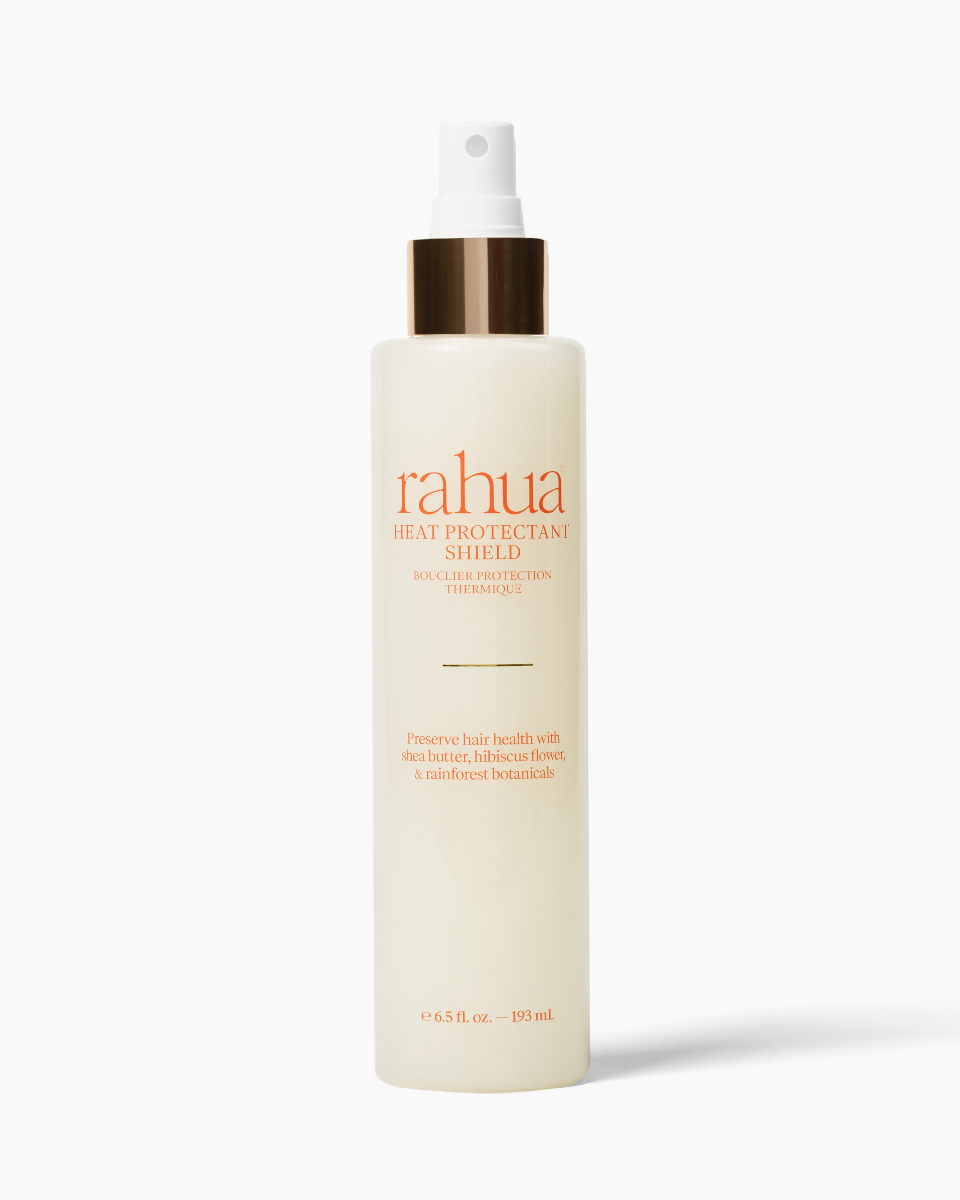 Rahua heat protectant spray bottle on a white background|variant:65-oz