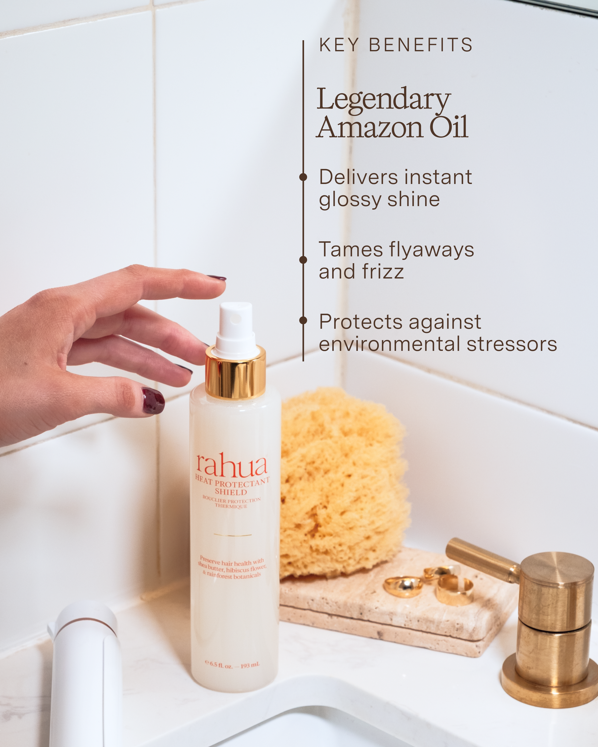 Bottle of rahua product on a bathroom counter with text highlighting key benefits.|variant:65-oz