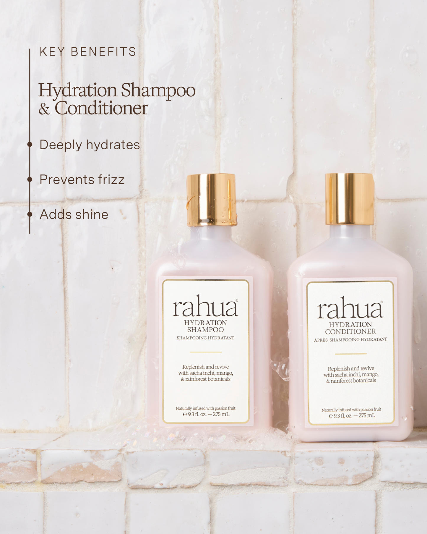 Two bottles of Rahua Hydration Shampoo and Conditioner on a tiled bathroom wall.|variant:93-oz,16-oz