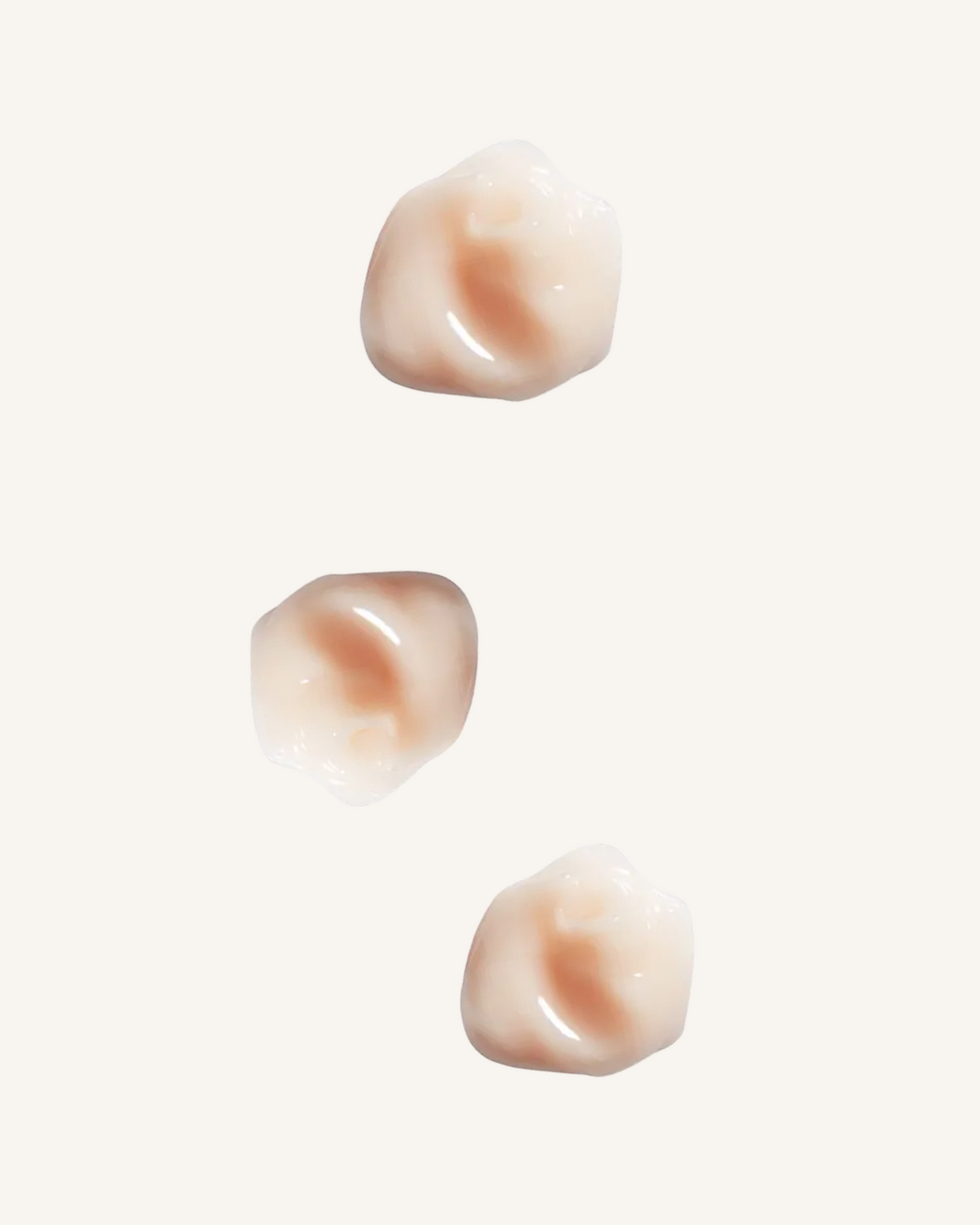 three dots of hydration shampoo a creme based shampoo a beigey pink against a soft beige background|variant:93-oz