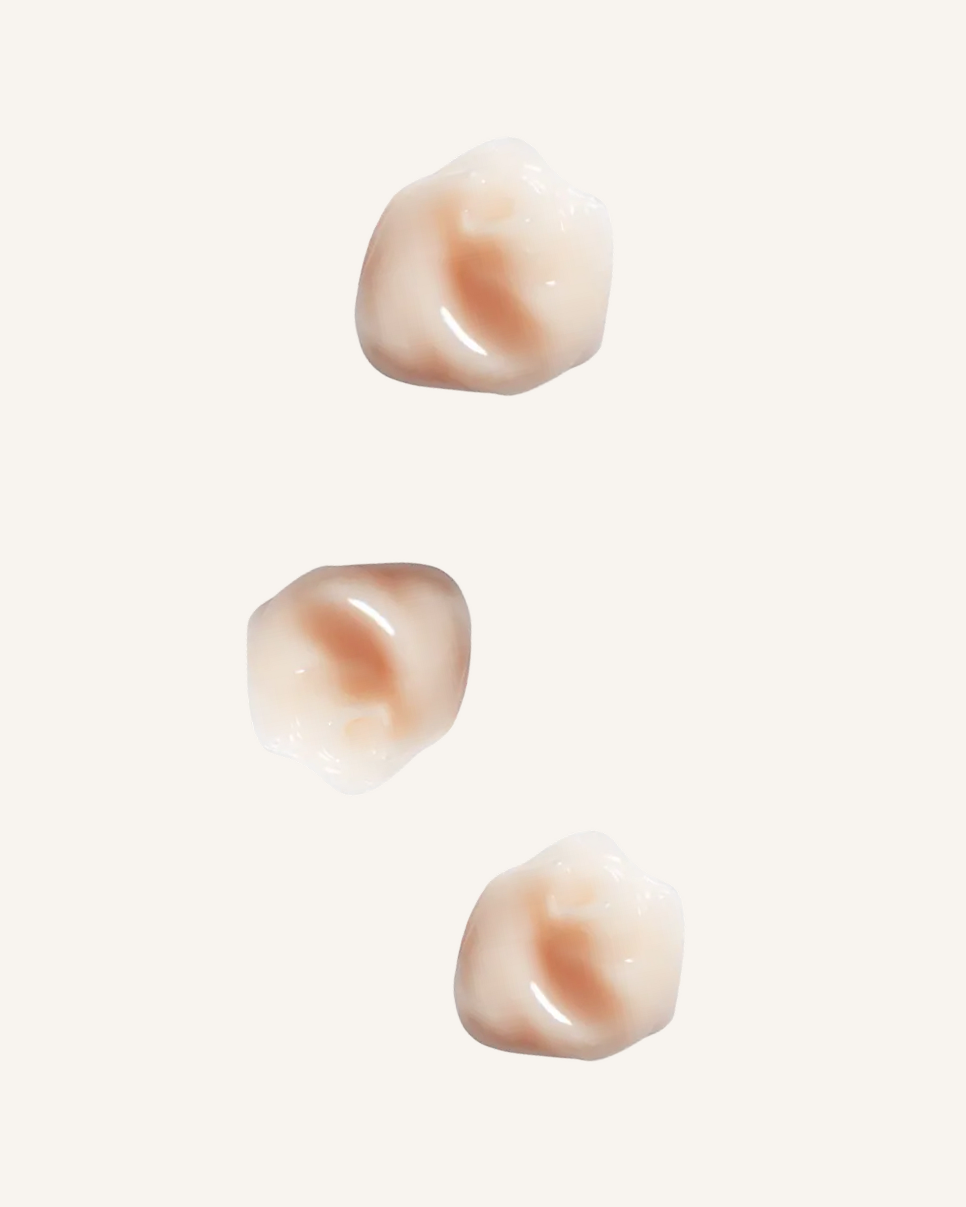 three dots of hydration shampoo a creme based shampoo a beigey pink against a soft beige background|variant:93-oz