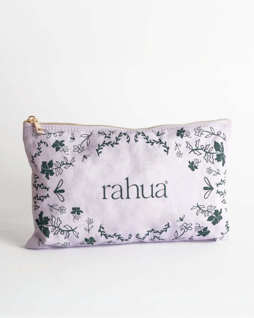 Pouch with rahua branding and floral pattern on a white background