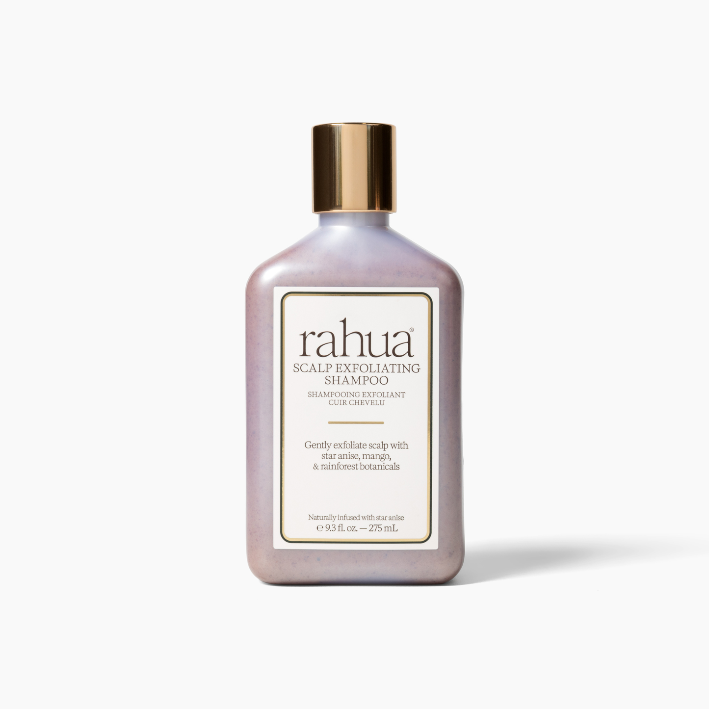 bottle with gold cap with white label and green letter rahua scalp exfoliating shampoo on soft off white background|variant:93-oz
