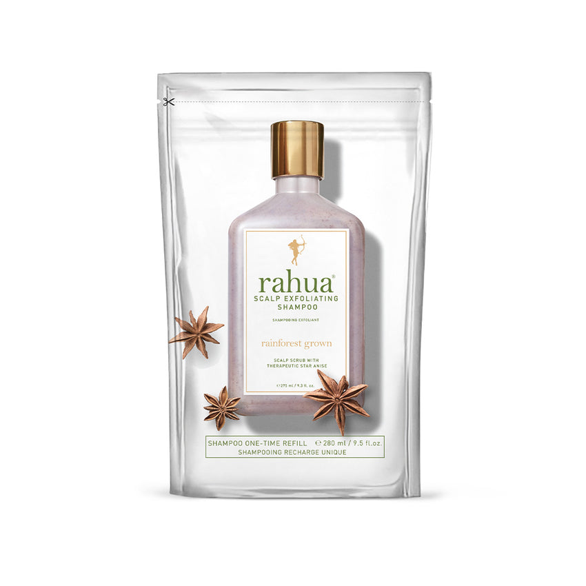 A pouch packaging of Rahua Scalp Exfoliating Shampoo Refill with a clear window showing a bottle of the shampoo inside, surrounded by decorative star anise.
