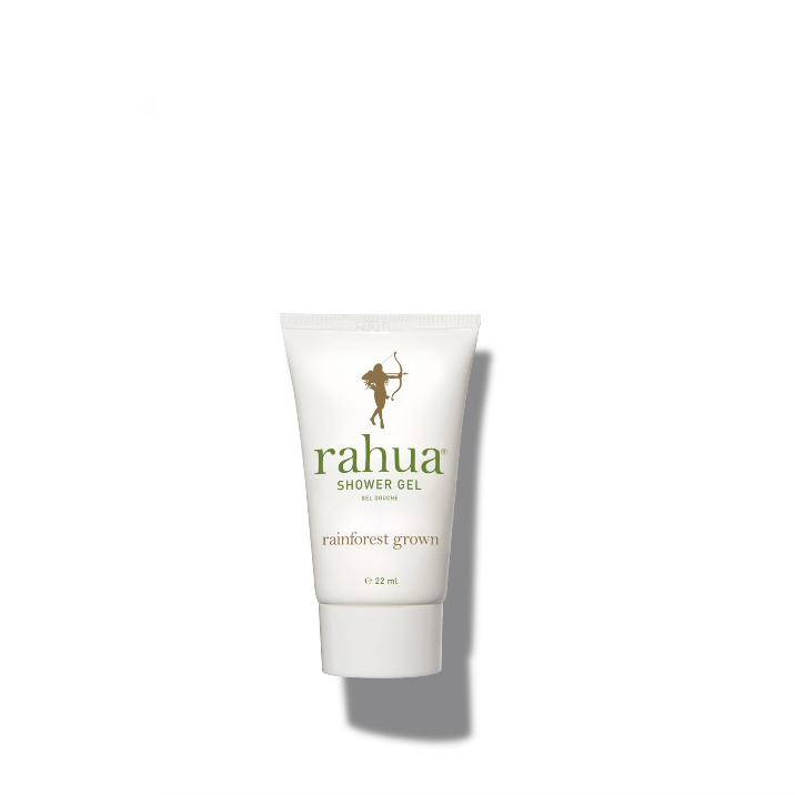 a white tube bottle of Rahua shower gel, featuring the brand's logo and the text 'Rainforest grown' on a plain white background|variant:074-oz