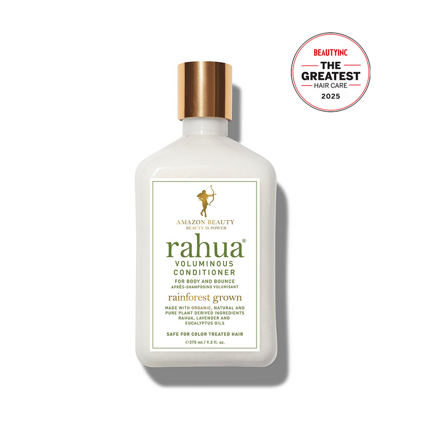 bottle with white product and a gold cap with green lettering with rahua voluminous conditioner on a white plain background|variant:93-oz