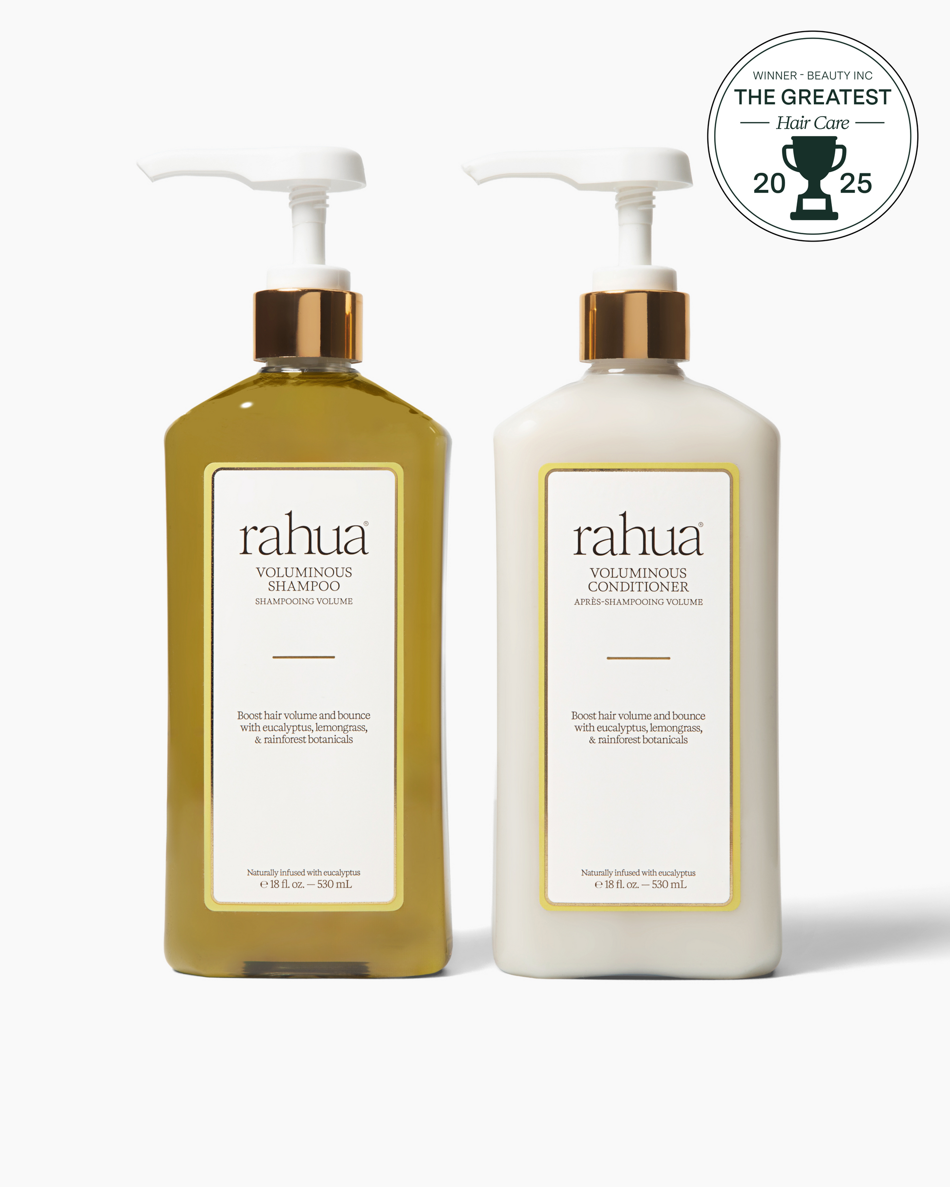 Two bottles of rahua voluminous shampoo and conditioner on a white background with an award badge.|variant:16-oz