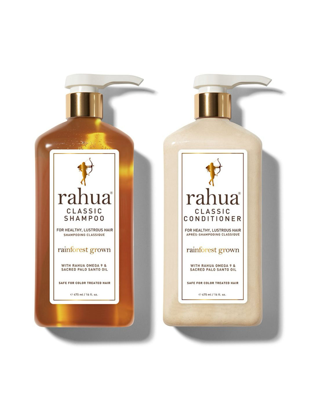 two bottles of 16 oz rahua classic shampoo and classic conditioner on a plain white background|variant:16-oz