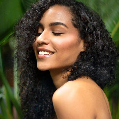 Women with soft curly hairs after using the control cream curl styler