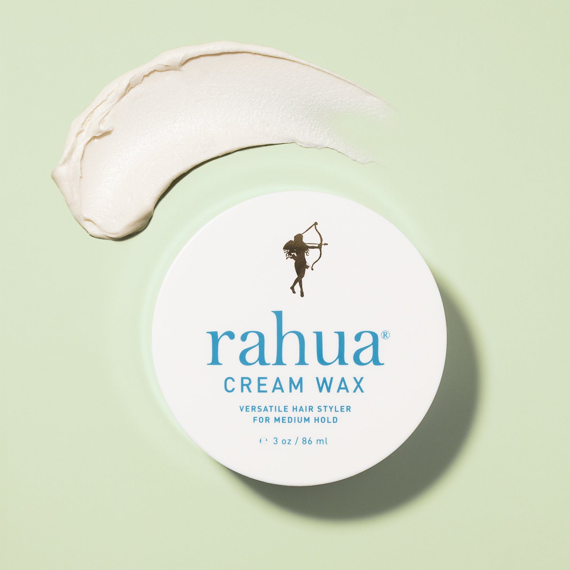 Rahua Cream Wax open Bottle/Jar with Around Plants Leaves